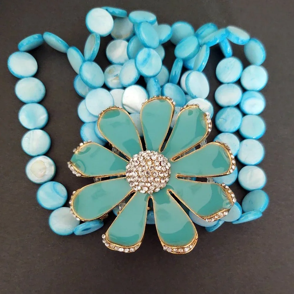 Dyed shell stretch bracelet w/enamel flower& cz's